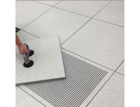 Access Floor Tiles are removed with a suction cup lifter.