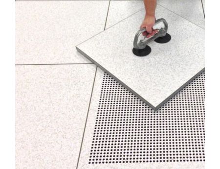 Computer Floor is raised with a panel lifter.