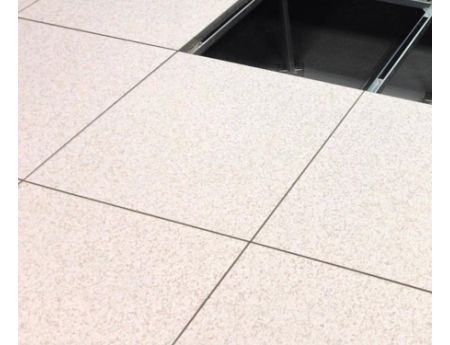 Raised computer floor tiles are replaceable and come in a variety of types.