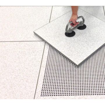 Computer Floor is raised with a panel lifter.