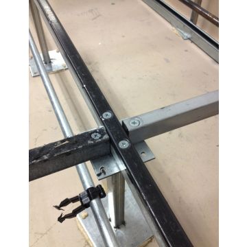 Stringers are rods that form a basic grid which provides lateral stability for raised floors