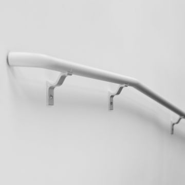 Wall mount handrail showing return to wall and brackets.